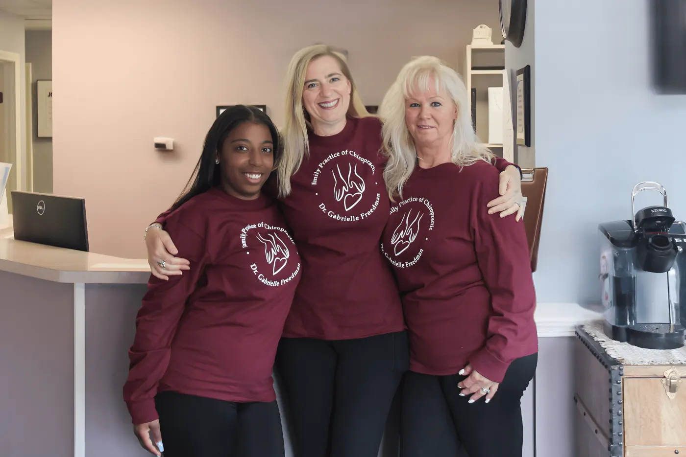 The Family Practice of Chiropractic team at the front desk